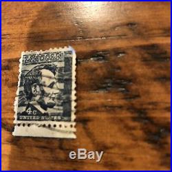Abraham Lincoln 4 cent black stamp used