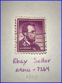 Abraham Lincoln 4 cent stamp purple