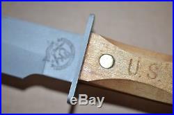 Ek combat knife wood handle stamped U. S. Subdued Bowie-style blade withsheath