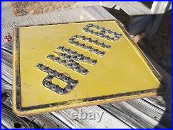 Embossed stamped steel 1930s road, highway sign BUMP. Glass marble reflectors