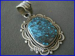 HAROLD J. Navajo Kingman Turquoise Antique Satin Sterling Silver Stamped Pendant