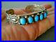 JEFF LARGO Native American Turquoise Row Sterling Silver Repousse Stamped Cuff
