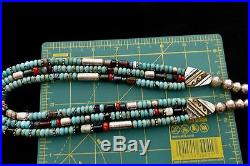 OLD TOMMY SINGER 31 Bead Necklace with Stamped silver beads, overlay separator