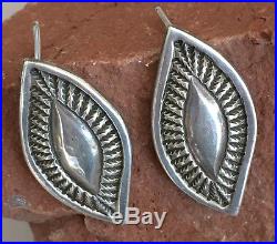PERRY SHORTY Navajo Carved Stamped Silver Post Earrings