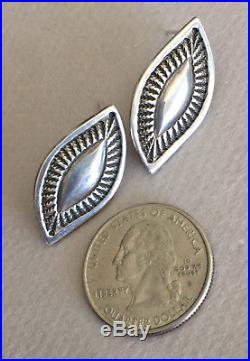 PERRY SHORTY Navajo Carved Stamped Silver Post Earrings