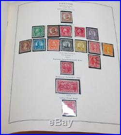 Scott US Stamp Album with $1,394.00 value in mint and used stamps